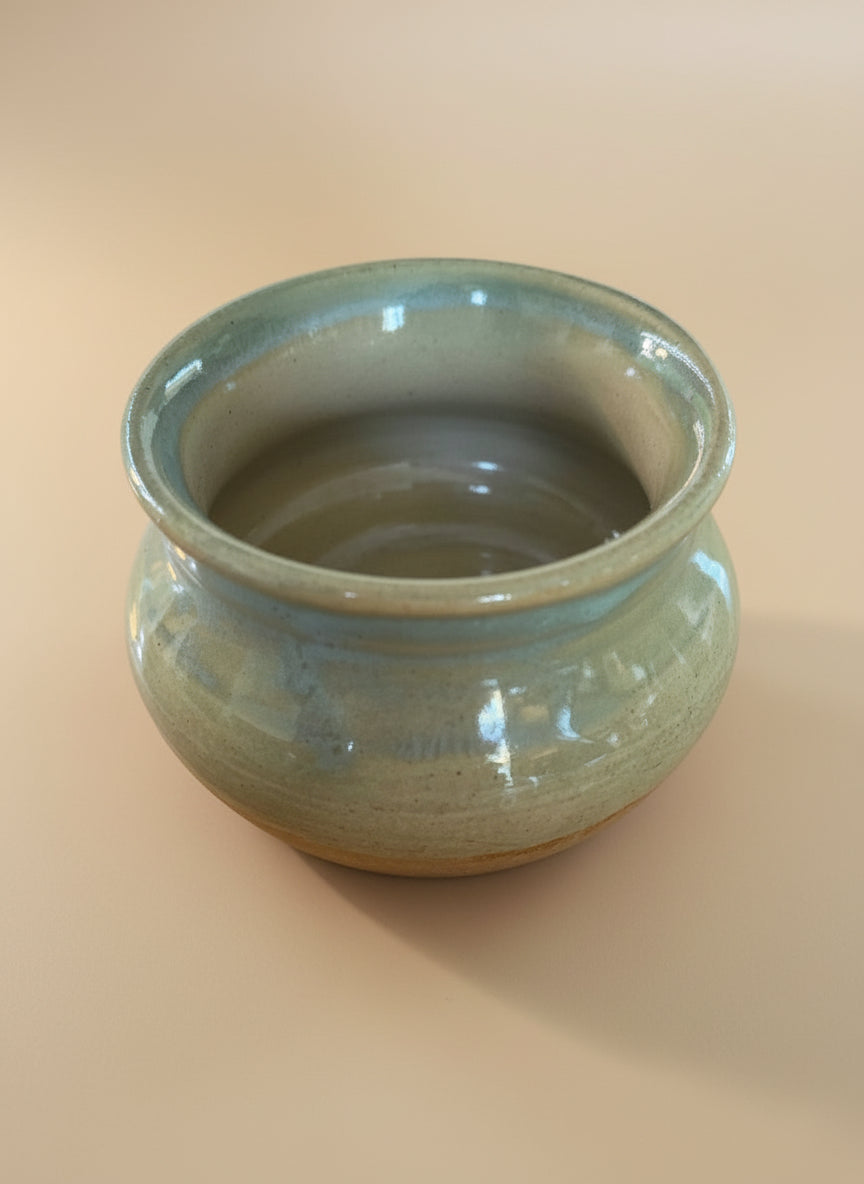Ceramic bowl on a wooden surface